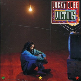 the album cover for Lucky Dube - Victims