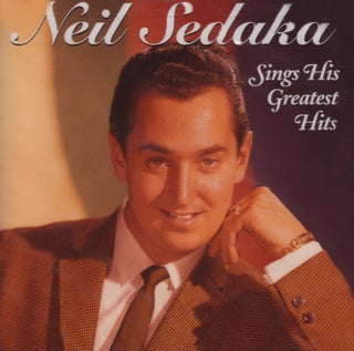 the album cover for Neil Sedaka - Sings His Greatest Hits