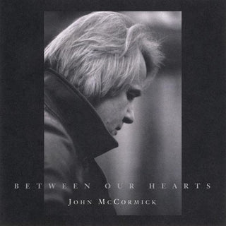 the album cover for John Mccormick - Between Our Hearts