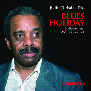 the album cover for Jodie Christian - Blues Holiday