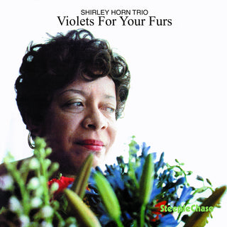 the album cover for Shirley Horn - Violets for Your Furs