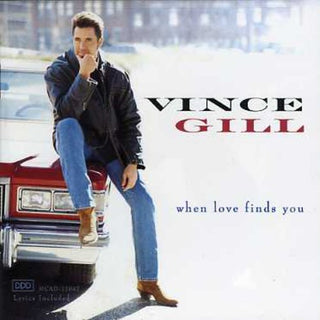 the album cover for Vince Gill - When Love Finds You