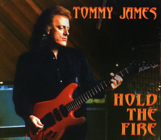 the album cover for Tommy James - Hold the Fire