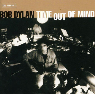the album cover for Bob Dylan - Time Out Of Time [Import]