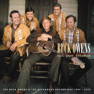 the album cover for Buck Owens - Tall Dark Stranger [Import]