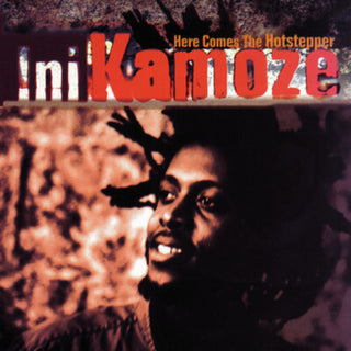 the album cover for Ini Kamoze - Here Comes the Hotstepper