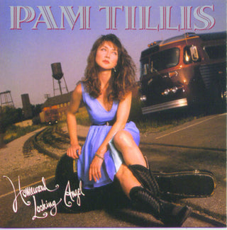 the album cover for Pam Tillis - Homeward Looking Angel
