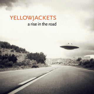the album cover for The Yellowjackets - A Rise In The Road