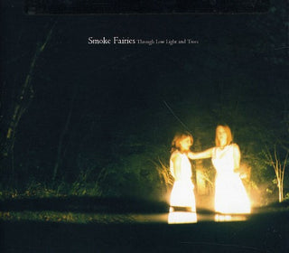 the album cover for Smoke Fairies - Through Low Light and Trees