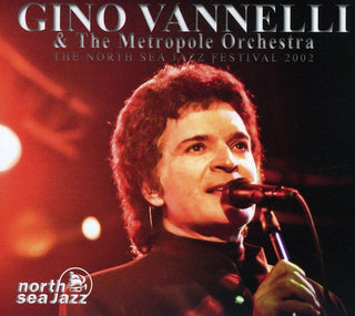 the album cover for Gino Vannelli & The Metropole Orchestra - The North Sea Jazz Festival 2002