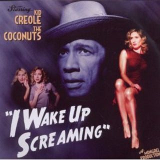 the album cover for Kid Creole - I Wake Up Screaming