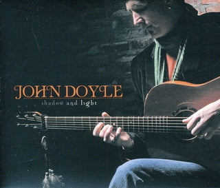 the album cover for John Doyle - Shadow and Light