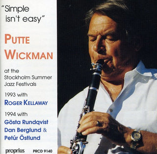 the album cover for Putte Wickman - Simple Isn't Easy
