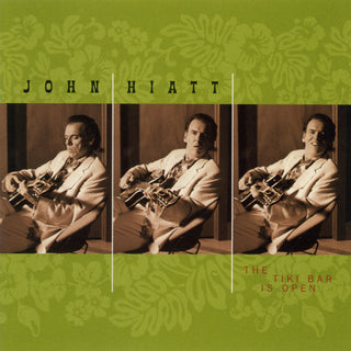 the album cover for John Hiatt - The Tiki Bar Is Open