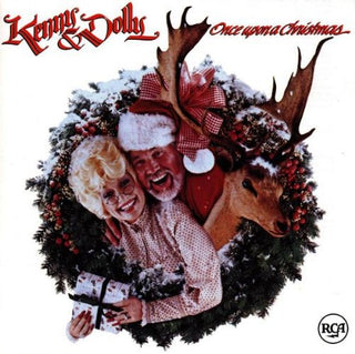 the album cover for ROGERS/PARTON - Once Upon A Christmas [Import]