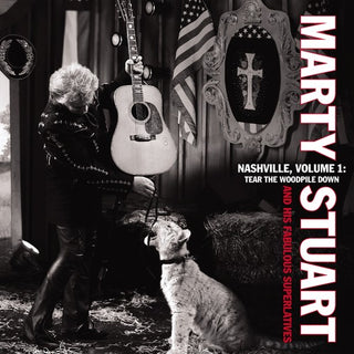 the album cover for Marty Stuart - Nashville, Vol. 1: Tear The Woodpile