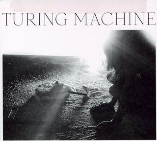 the album cover for Turing Machine - What Is the Meaning of What