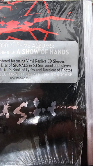 Rush- Sector 3: Five Albums (Signals Through A Show Of Hands) (4xCD/1xDVD In Partially Torn Shrinkwrap w/ Hype Stickers & Cut Through Barcode)