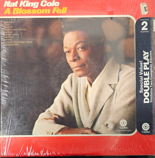 Nat King Cole- Walkin' My Baby Back Home/A Blossom Fell (Used Vinyl)