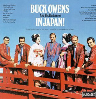 the album cover for Buck Owens & His Buckaroos - Buck Owens And His Buckaroos In Japan