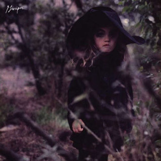 the album cover for Grouper - Dragging a Dead Deer Up a Hill