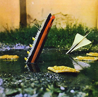 the album cover for Pete Brown & Piblokto! - Thousands on a Raft