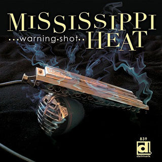 the album cover for Mississippi Heat - Warning Shot