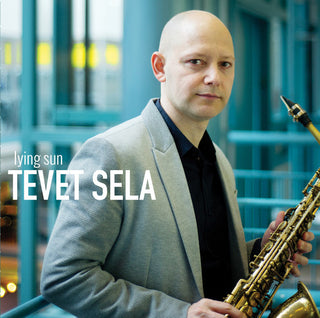 the album cover for Tevet Sela - Lying Sun (Feat. Martin Auguste, Morgan Moore &amp; John Roney)