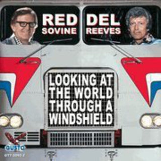 the album cover for Del Reeves - Looking at the World