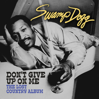 the album cover for Swamp Dogg - Don't Give Up on Me - Lost Country Album