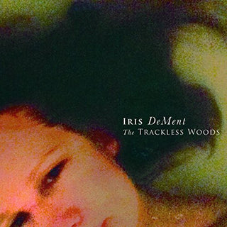 the album cover for Iris DeMent - Trackless Woods