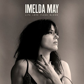 the album cover for Imelda May - Life Love Flesh Blood