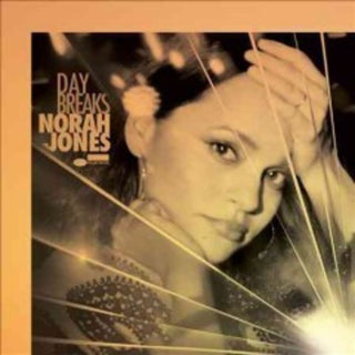 the album cover for Norah Jones - Day Breaks