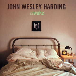 the album cover for John Wesley Harding - Awake