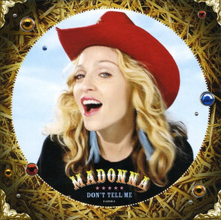 the album cover for Madonna - Don't Tell Me
