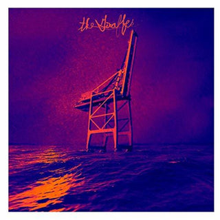 the album cover for The Giraffes - Flower Of The Cosmos [LP]