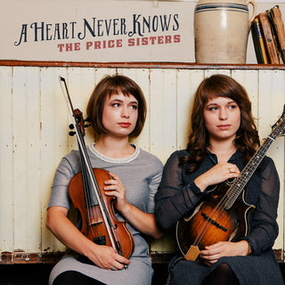 the album cover for The Price Sisters - A Heart Never Knows [Digipak]