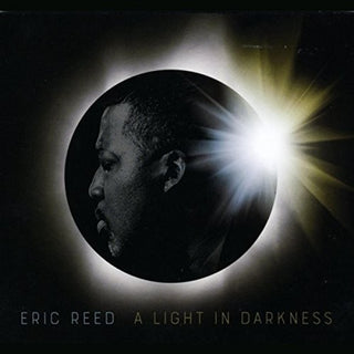 the album cover for Eric Reed - A Light In Darkness