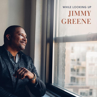 the album cover for Jimmy Greene - While Looking Up