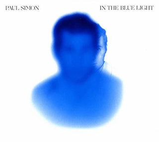 the album cover for Paul Simon - In The Blue Light