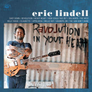 the album cover for Eric Lindell - Revolution In Your Heart