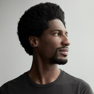 the album cover for Jon Batiste - Hollywood Africans