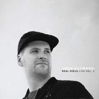 the album cover for John Raymond & Real Feels - Real Feels: Live Vol. 2