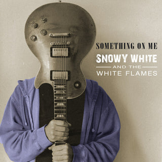 the album cover for Snowy White - Something On Me