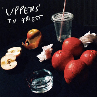 the album cover for TV Priest - Uppers