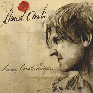 the album cover for Almost Charlie - Loving Counterclockwise