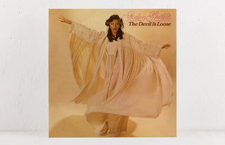 the album cover for Asha Puthli - The Devil Is Loose