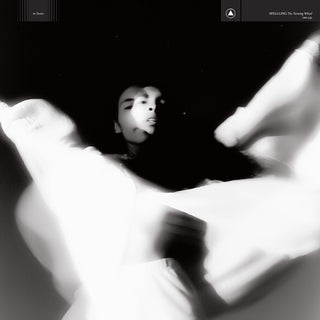 the album cover for SPELLLING - The Turning Wheel