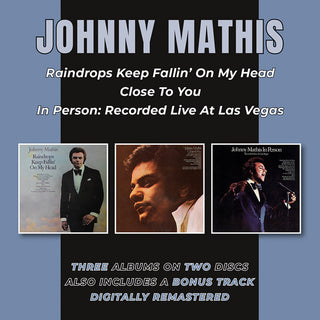 the album cover for Johnny Mathis - Raindrops Keep Fallin On My Head / Close To You