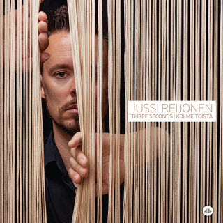 the album cover for Jussi Reijonen - Three Seconds - Kolme Toista
